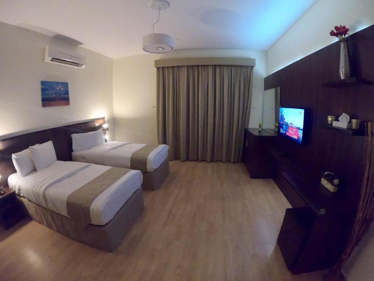 Weekend Hotel & Apartments Маскат Экстерьер фото