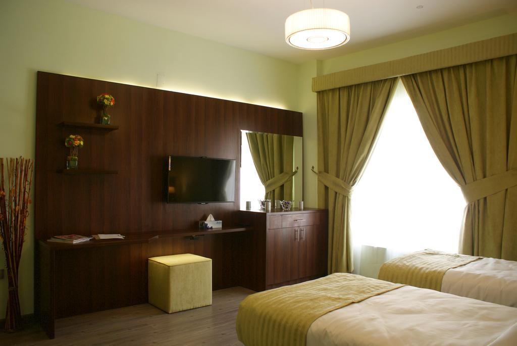 Weekend Hotel & Apartments Маскат Номер фото